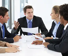 Business professionals discussing company matters